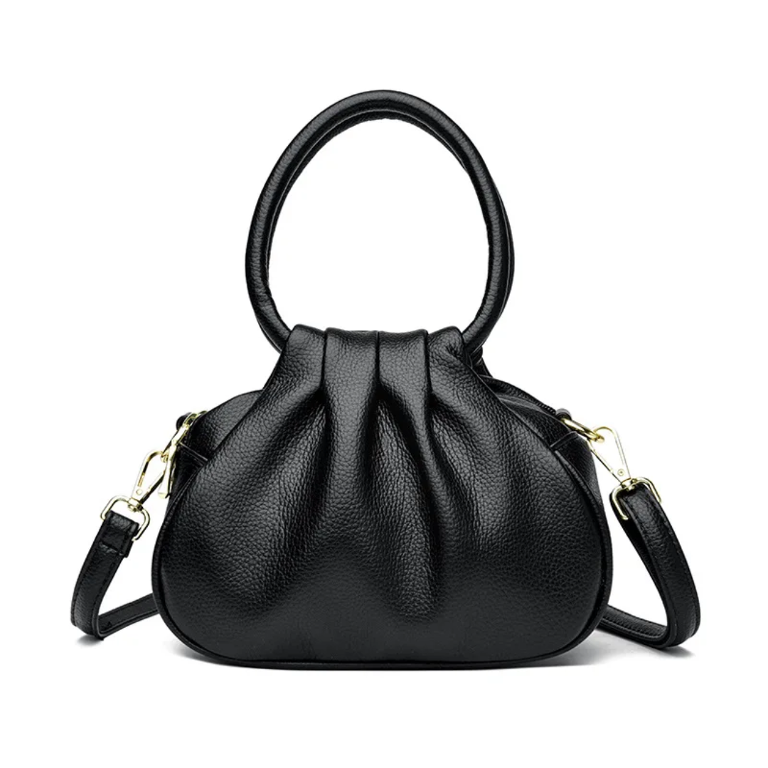 Elegant Handbag
A chic and versatile handbag featuring a stylish top handle, adjustable shoulder strap, and elegant gold-tone details. Perfect for everyday wear or special occasions.
Chic • Elegant • Versatile