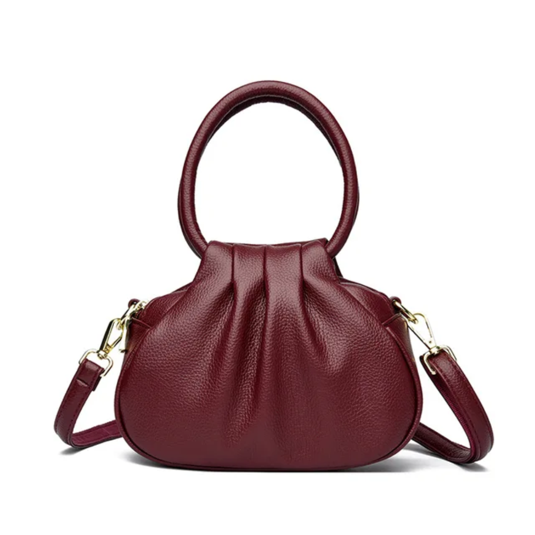 Elegant Handbag
A chic and versatile handbag featuring a stylish top handle, adjustable shoulder strap, and elegant gold-tone details. Perfect for everyday wear or special occasions.
Chic • Elegant • Versatile