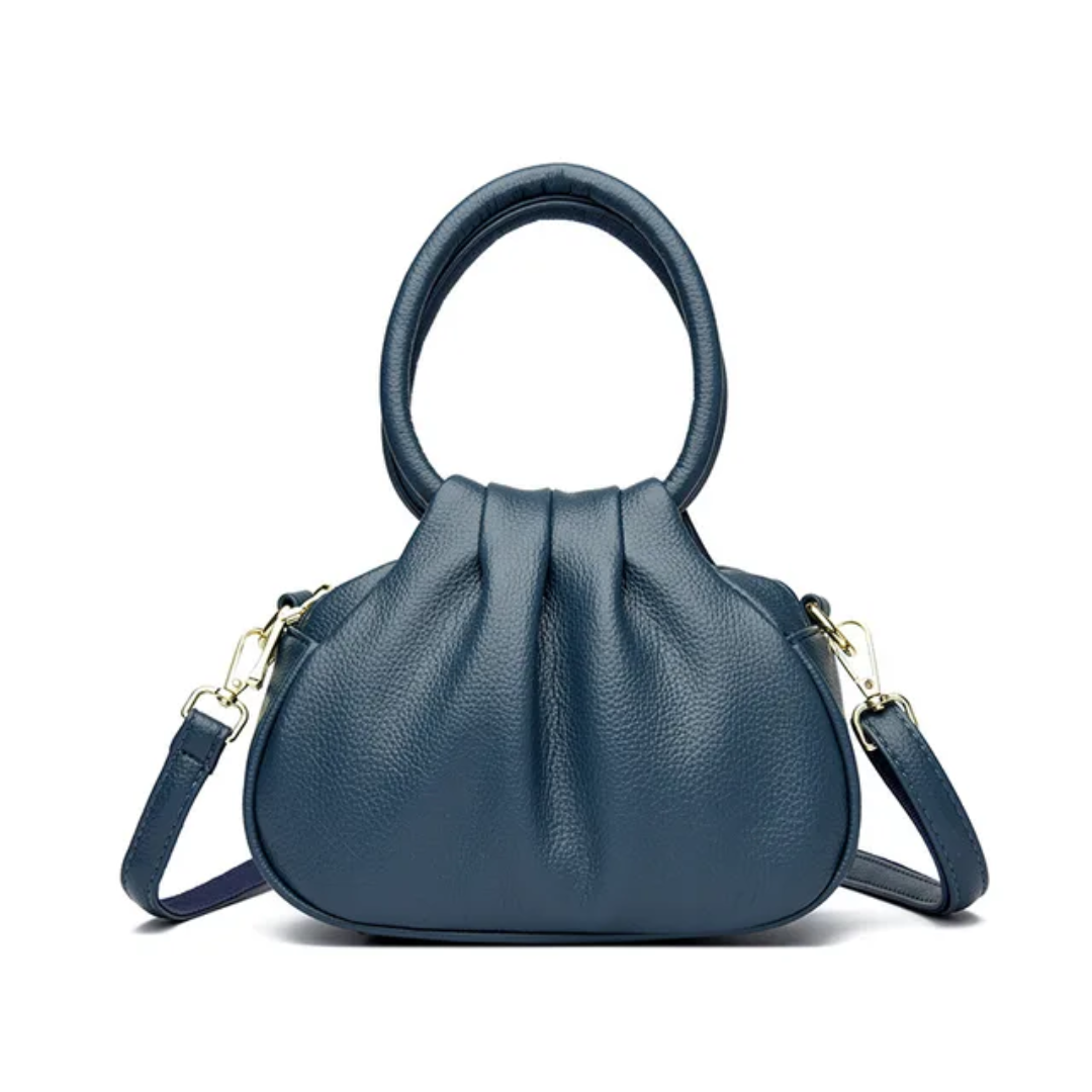 Elegant Handbag
A chic and versatile handbag featuring a stylish top handle, adjustable shoulder strap, and elegant gold-tone details. Perfect for everyday wear or special occasions.
Chic • Elegant • Versatile